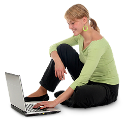 blonde woman with green shirt on a laptop