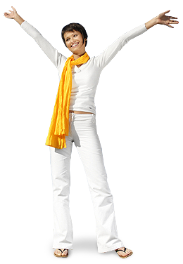 brunette woman standing with arms up and out wearing a yellow scarf